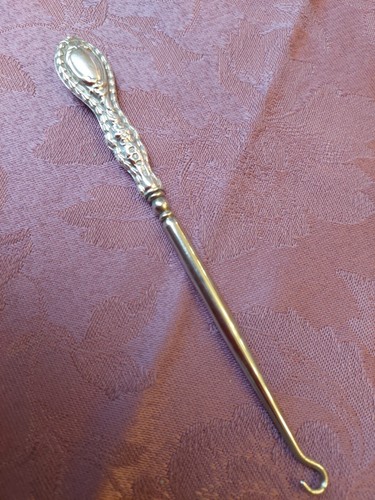 Verspielter knopfhaken - verspielter,